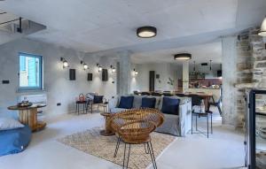 a living room with a couch and a table at Villa Casa Jovanin in Livade