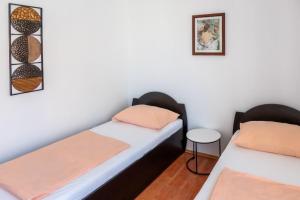 Postel nebo postele na pokoji v ubytování Apartment Luca