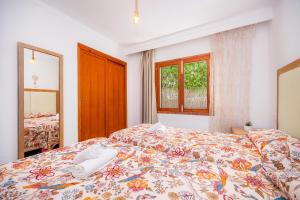 Postel nebo postele na pokoji v ubytování Apartamento Felipe 1-3