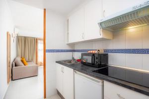 Kuchyňa alebo kuchynka v ubytovaní Apartamento Felipe 2-5