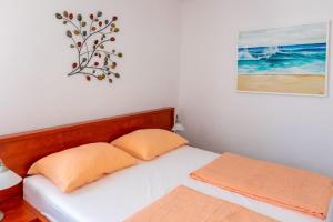 Postel nebo postele na pokoji v ubytování Apartment Luca
