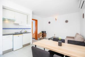 Kuchyň nebo kuchyňský kout v ubytování Apartamento Felipe 1-3