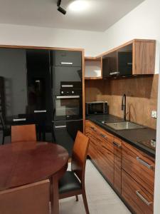 Η κουζίνα ή μικρή κουζίνα στο Apartament MARILYN - Bezpłatny Garaż - Dostęp na Kod - FV