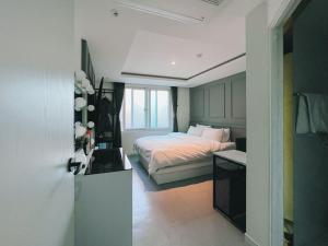 Postel nebo postele na pokoji v ubytování C-line Hotel