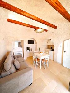 Χώρος καθιστικού στο Trullo dueConi +31 φωτογραφίες