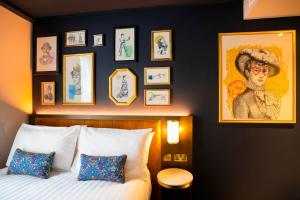 Ένα ή περισσότερα κρεβάτια σε δωμάτιο στο The Mercantile Hotel