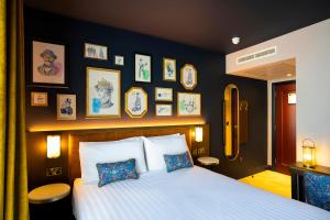 Ένα ή περισσότερα κρεβάτια σε δωμάτιο στο The Mercantile Hotel