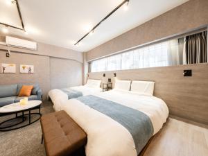 Posteľ alebo postele v izbe v ubytovaní Akihabara Sta 13min, Kanda Sta 10min,Ogawamachi 2min,Hotel Prime Inn Kanda,