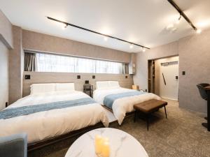 Posteľ alebo postele v izbe v ubytovaní Akihabara Sta 13min, Kanda Sta 10min,Ogawamachi 2min,Hotel Prime Inn Kanda,
