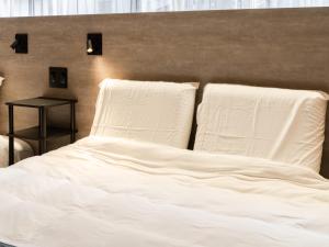 Posteľ alebo postele v izbe v ubytovaní Akihabara Sta 13min, Kanda Sta 10min,Ogawamachi 2min,Hotel Prime Inn Kanda,