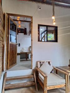 Giường trong phòng chung tại Liwanag