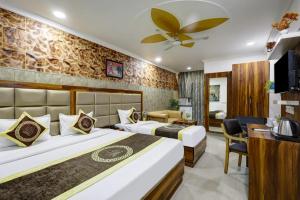 TV a/nebo společenská místnost v ubytování Hotel Armani Deluxe By SMART GROUP