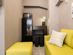 Istumisnurk majutusasutuses Akihabara Sta 13min, Kanda Sta 10min,Ogawamachi 2min,Hotel Prime Inn Kanda,