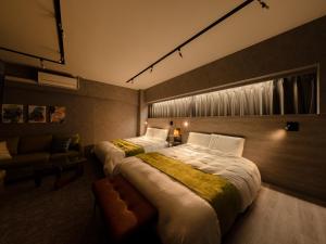 Posteľ alebo postele v izbe v ubytovaní Akihabara Sta 13min, Kanda Sta 10min,Ogawamachi 2min,Hotel Prime Inn Kanda,
