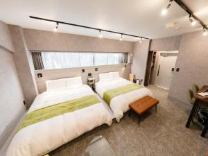 Posteľ alebo postele v izbe v ubytovaní Akihabara Sta 13min, Kanda Sta 10min,Ogawamachi 2min,Hotel Prime Inn Kanda,