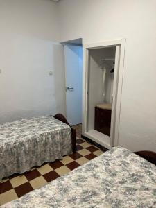 Katil atau katil-katil dalam bilik di A un paso de Sevilla