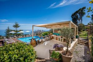 een afbeelding van een zwembad bij een villa bij VILLA PROVENZA 12&4, Emma Villas in Cefalù