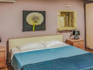 Posteľ alebo postele v izbe v ubytovaní Holiday Home Erika by Interhome