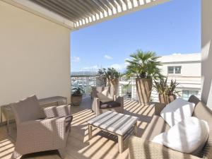 Balkón nebo terasa v ubytování Apartment La Marina by Interhome