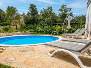 Bazén v ubytovaní Holiday Home Ofelia by Interhome alebo v jeho blízkosti