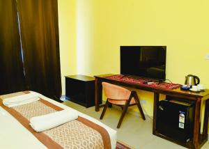 TV a/nebo společenská místnost v ubytování Tvessa - a Boutique hotel