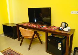TV a/nebo společenská místnost v ubytování Tvessa - a Boutique hotel
