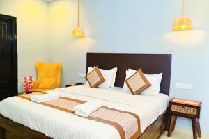 Postel nebo postele na pokoji v ubytování Tvessa - a Boutique hotel
