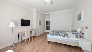 Postel nebo postele na pokoji v ubytování Flat in Zizkov -204-