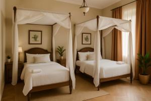 Кровать или кровати в номере INRU Resort