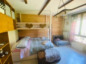A bed or beds in a room at La Lanterna sui Monti