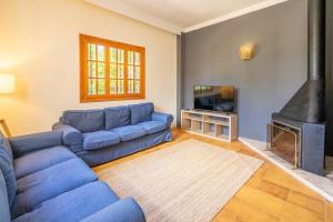A television and/or entertainment centre at Villa d'Es Trenc