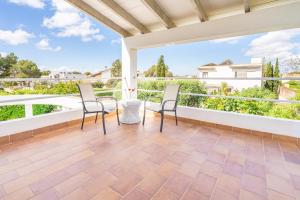 A balcony or terrace at Villa d'Es Trenc