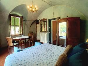 Łóżko lub łóżka w pokoju w obiekcie La Casa Rosa
