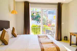 Postel nebo postele na pokoji v ubytování Tvessa - a Boutique hotel