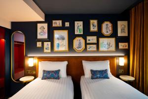 Ένα ή περισσότερα κρεβάτια σε δωμάτιο στο The Mercantile Hotel