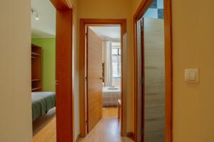 Rossio Suites By Hosty客房内的一张或多张床位