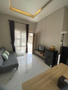 Posezení v ubytování Gebe House - Guest House & Homestay Jogja