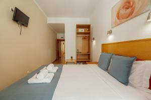 Rossio Suites By Hosty客房内的一张或多张床位