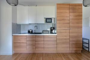 Kuchnia lub aneks kuchenny w obiekcie Apartamenty Kuracyjna