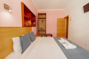 Rossio Suites By Hosty客房内的一张或多张床位