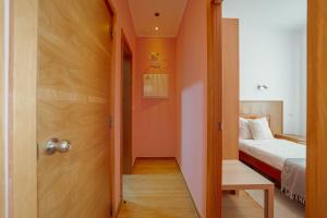 Rossio Suites By Hosty客房内的一张或多张床位