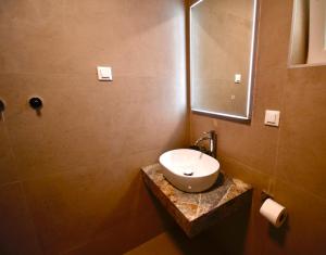 a bathroom with a sink and a mirror at Dubrovnik Icy Guest House in Dubrovnik