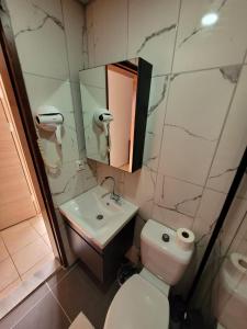 Koupelna v ubytování Best Hotel
