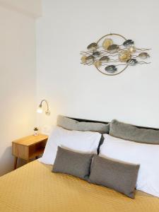 Katil atau katil-katil dalam bilik di Chelona - Coastal Apartment