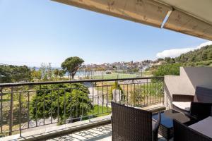 a balcony with a view of the ocean at Sithonia Blue in Neos Marmaras