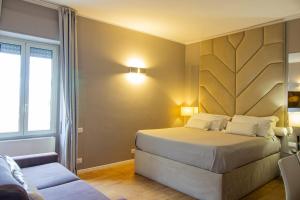 Posteľ alebo postele v izbe v ubytovaní Album Boutique Rooms