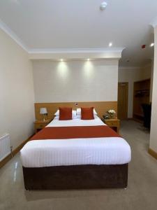 Postel nebo postele na pokoji v ubytování Victoria Hotel