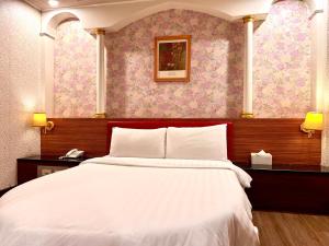 Postel nebo postele na pokoji v ubytování Hotel Lee-Chan