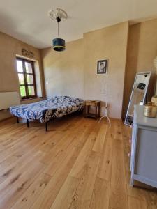 Fotografie z fotogalerie ubytování 2 CHAMBRES DANS MAISON EN PIERRE ATYPIQUe v destinaci Lœuilley