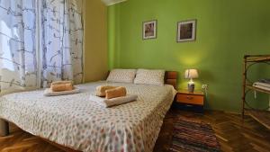 En eller flere senge i et værelse på Sea View Danijela 2-4 pax